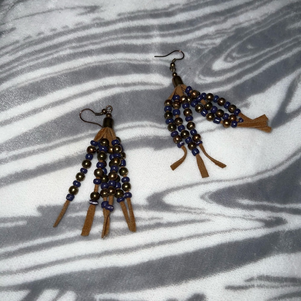Beautifully hand made earrings beads with leather